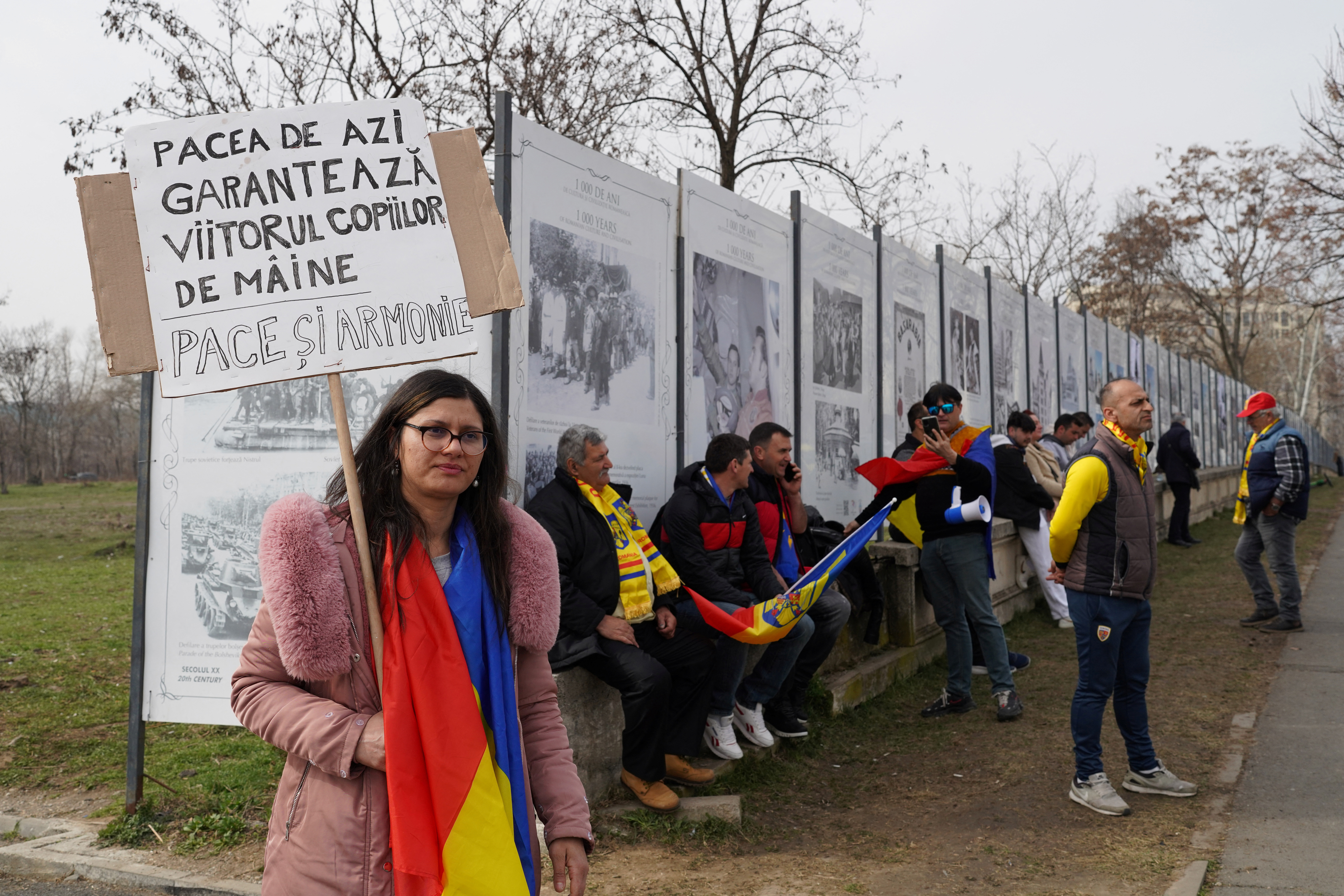 Cornelia Borta holds a placard during a protest in front of the Constitutional Court of Romania