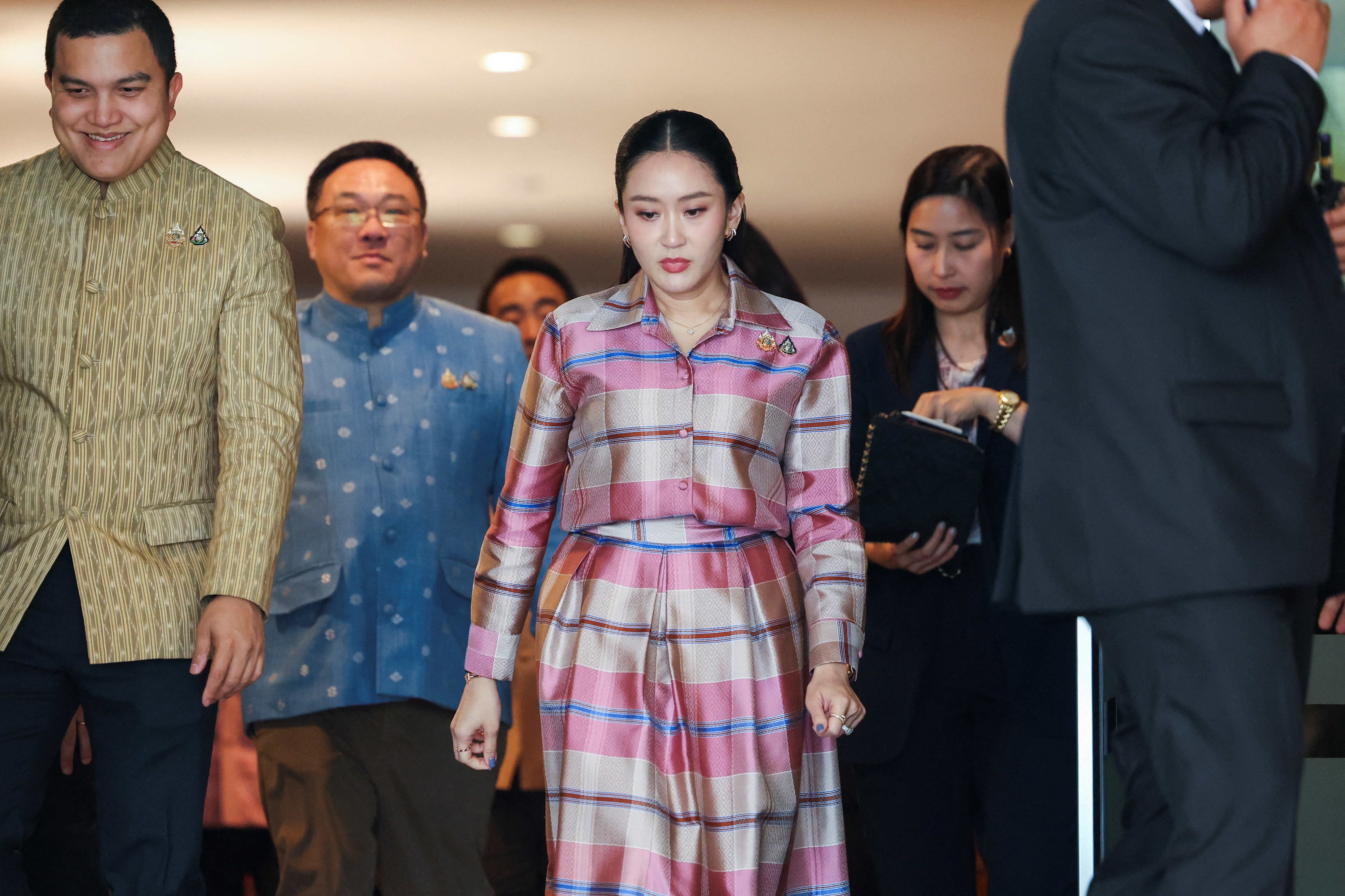 Thailand's Prime Minister Paetongtarn Shinawatra walks after a cabinet meeting at the Government House in Bangkok