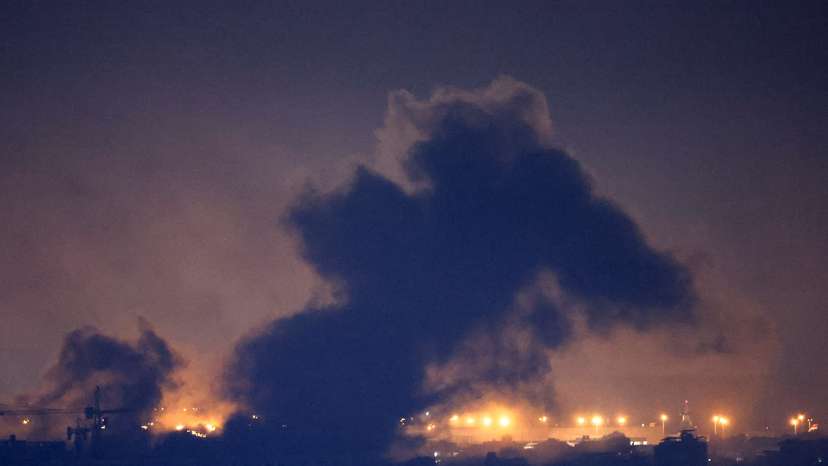 Smoke billows over Beirut's southern suburbs after a strike, amid ongoing hostilities between Hezbollah and Israeli forces