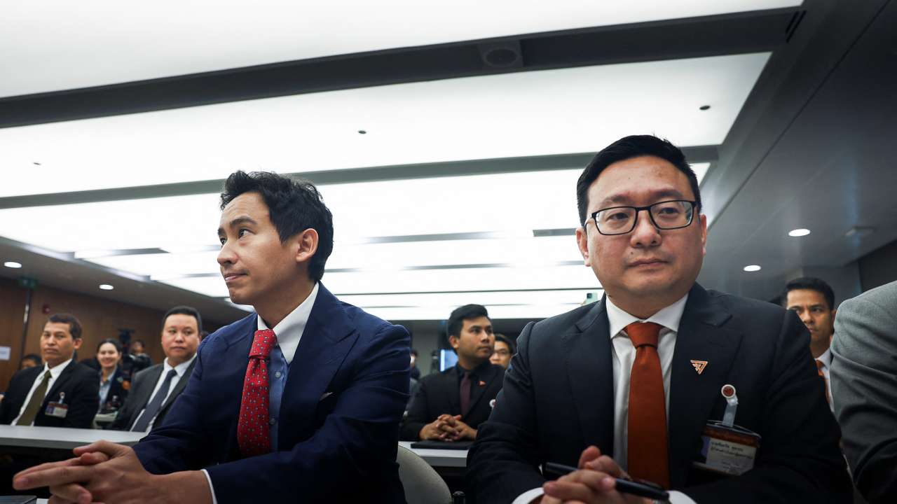 Former Move Forward Party leader Pita Limjaroenrat and party's members sit on the day Thailand's Constitutional Court delivers its verdict on election winner's bid to amend a law against insulting the monarchy, in Bangkok