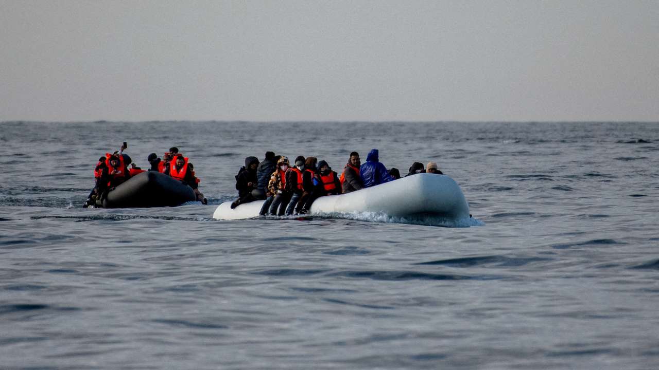 FILE PHOTO: Migrants cross the English Channel in small boats