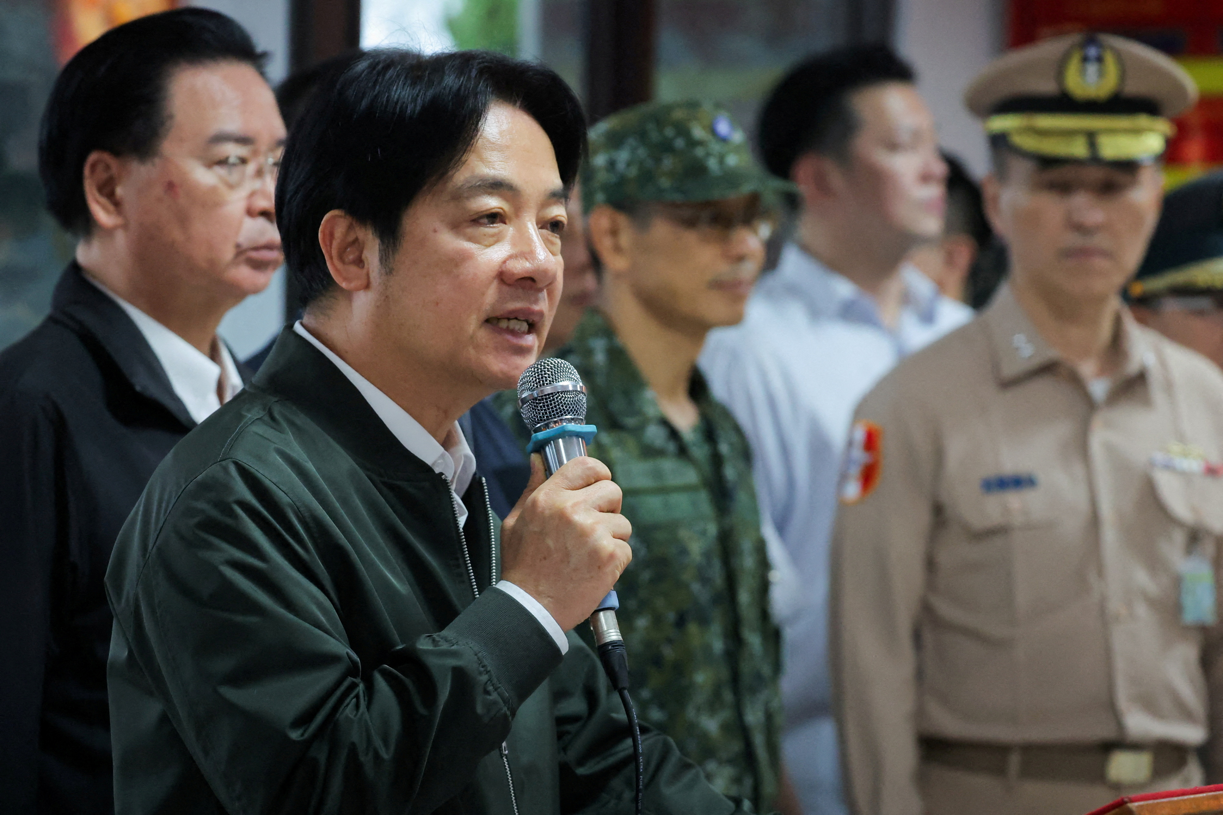 FILE PHOTO: Taiwan President Lai Ching-te makes a speech during his visit to a military camp in Taoyuan