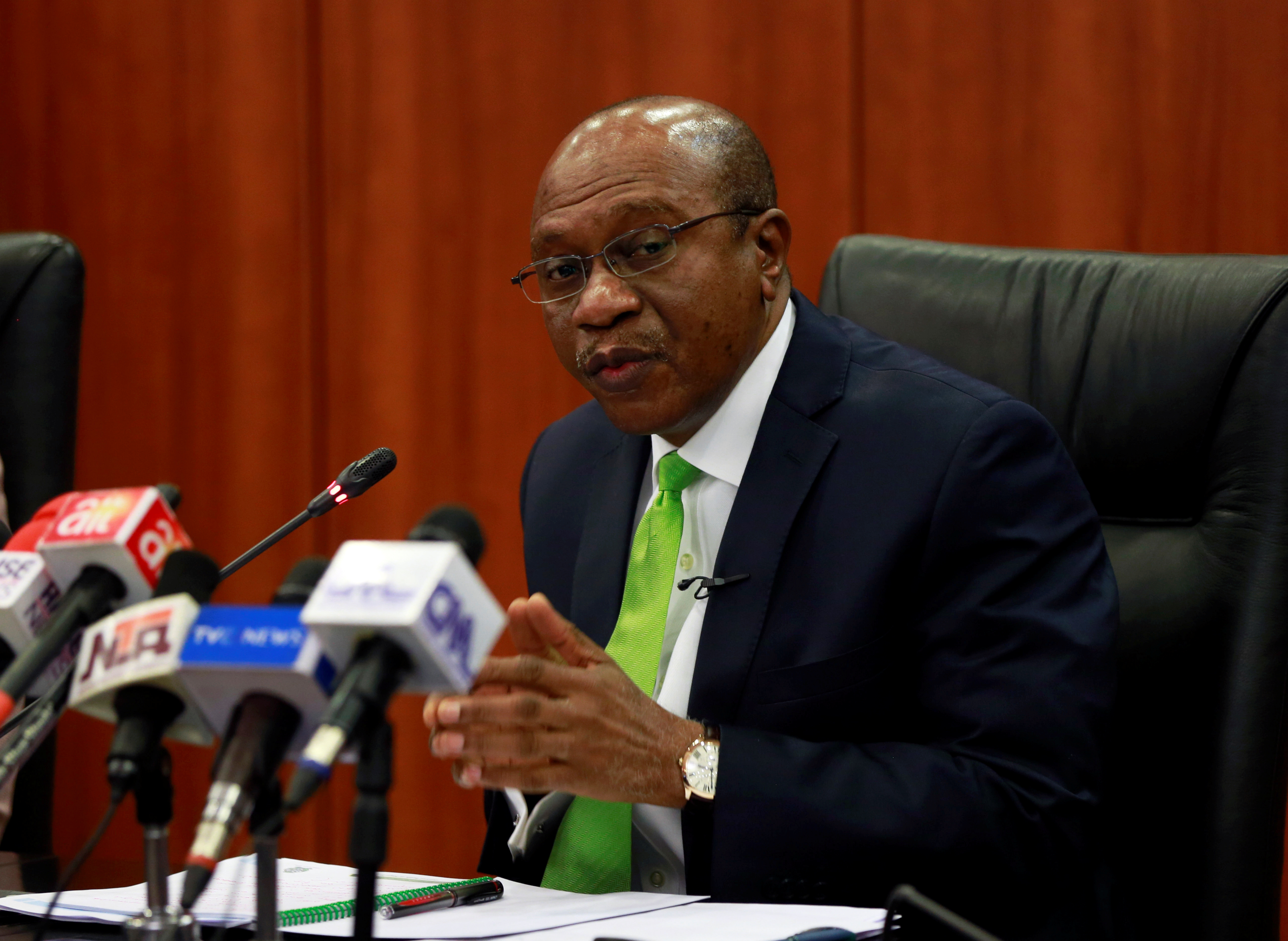 Nigeria's Central Bank Governor Godwin Emefiele briefs the media during the MPC meeting in Abuja