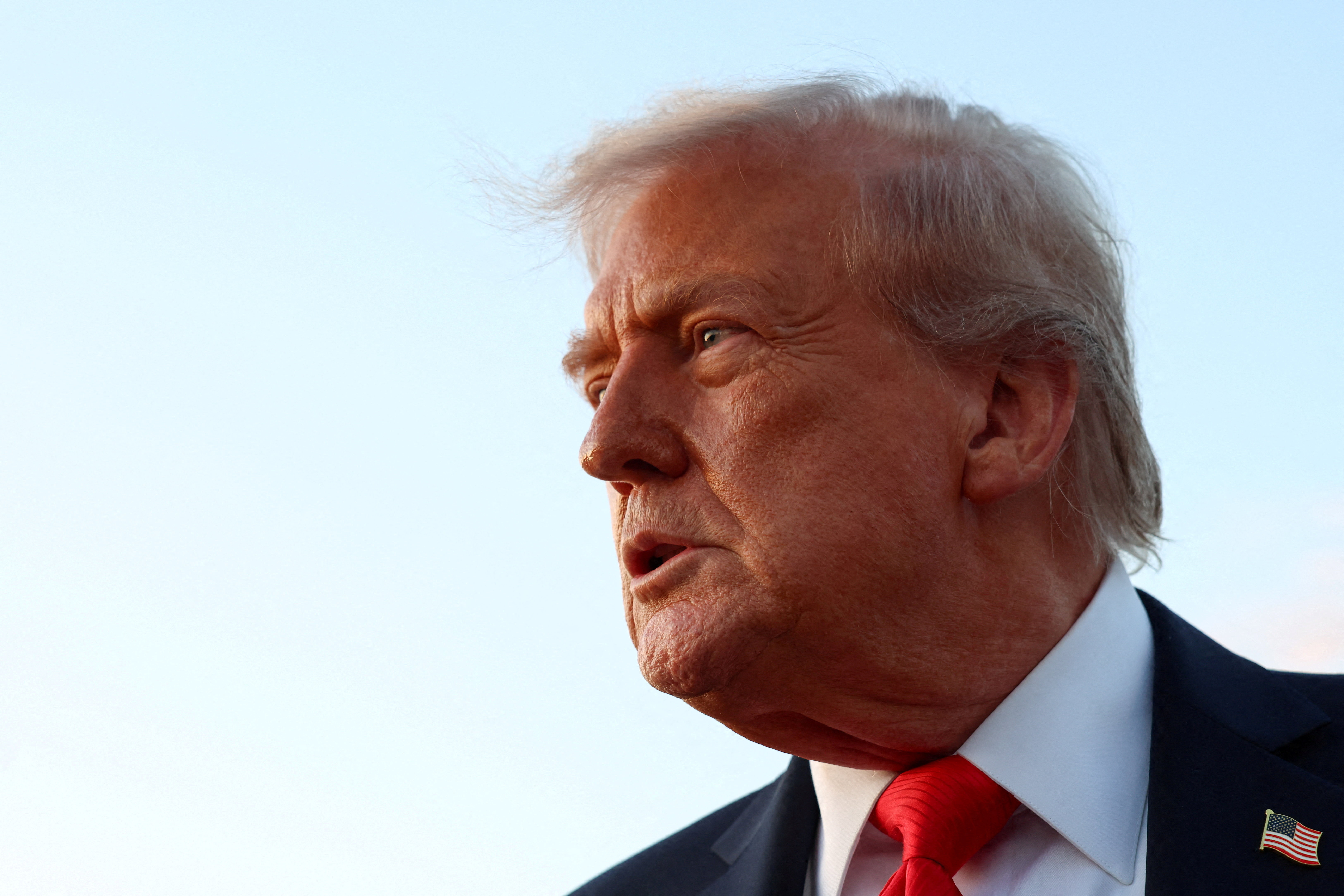 U.S. President Donald Trump speaks to the press at Joint Base Andrews