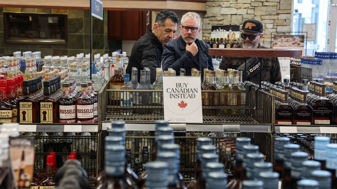 Empty shelves remain with signs ''Buy Canadian Instead'' after the top five U.S. liquor brands were removed from sale at a B.C. Liquor Store, in Vancouver