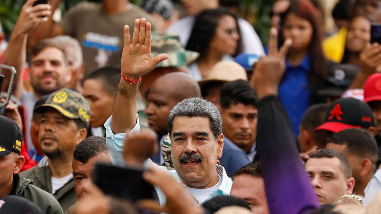 FILE PHOTO: Government supporters march to commemorate the Battle of Santa Ines, in Caracas