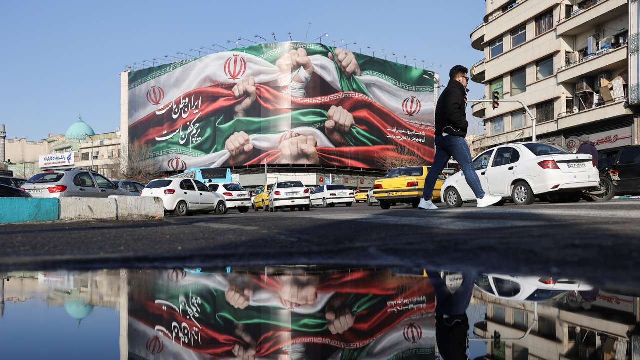 A billboard with a picture of Iran's flag, on a building in Tehran