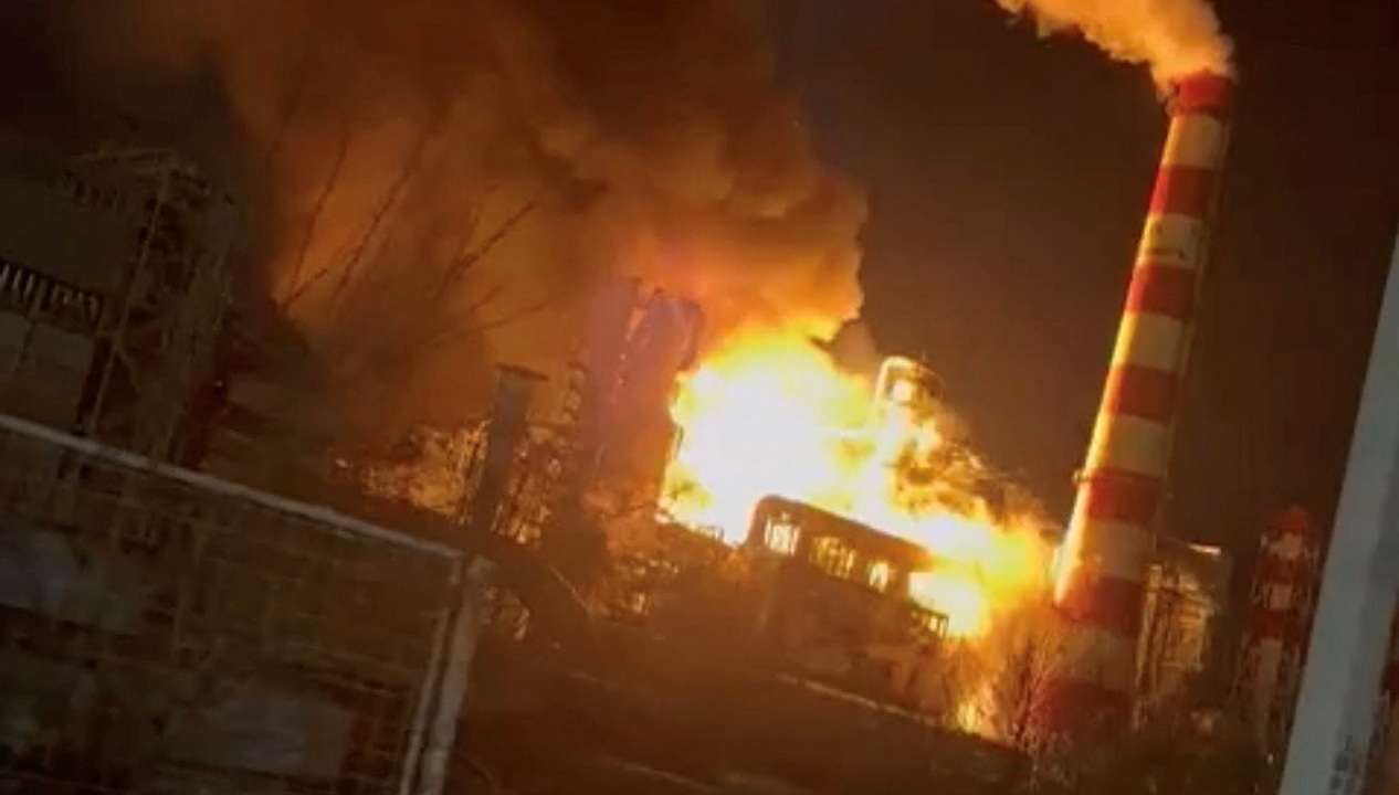 Smoke and flames rise after a fire broke out at a large oil refinery in Tuapse
