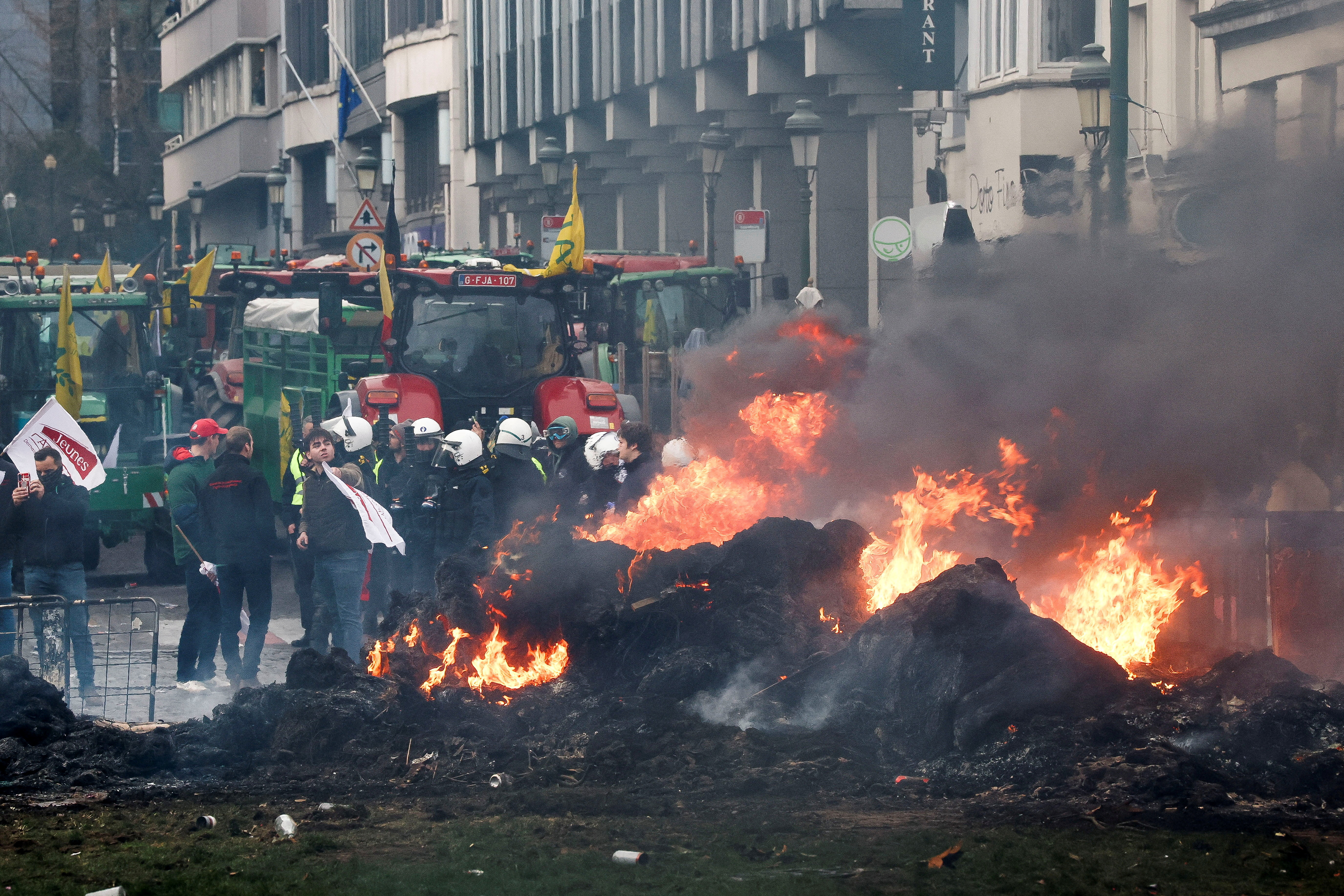 FILE PHOTO: Farmers rally in a large-scale protest in Brussels as leaders meet in EU summit