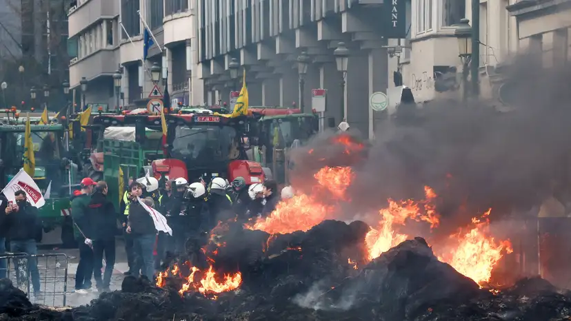 FILE PHOTO: Farmers rally in a large-scale protest in Brussels as leaders meet in EU summit