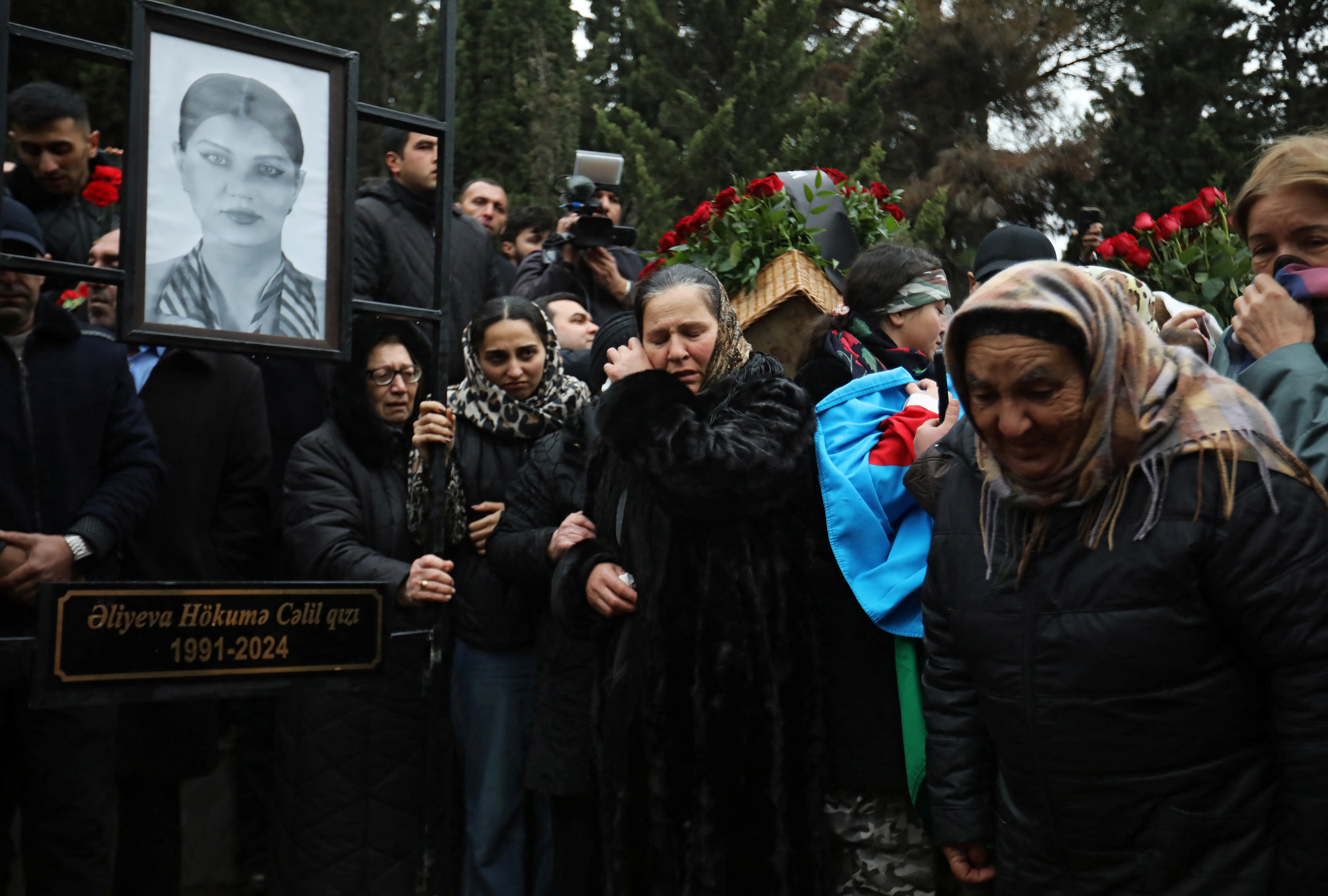 Funeral of the crew members of the Azerbaijan Airlines passenger plane that crashed in Kazakhstan, in Baku