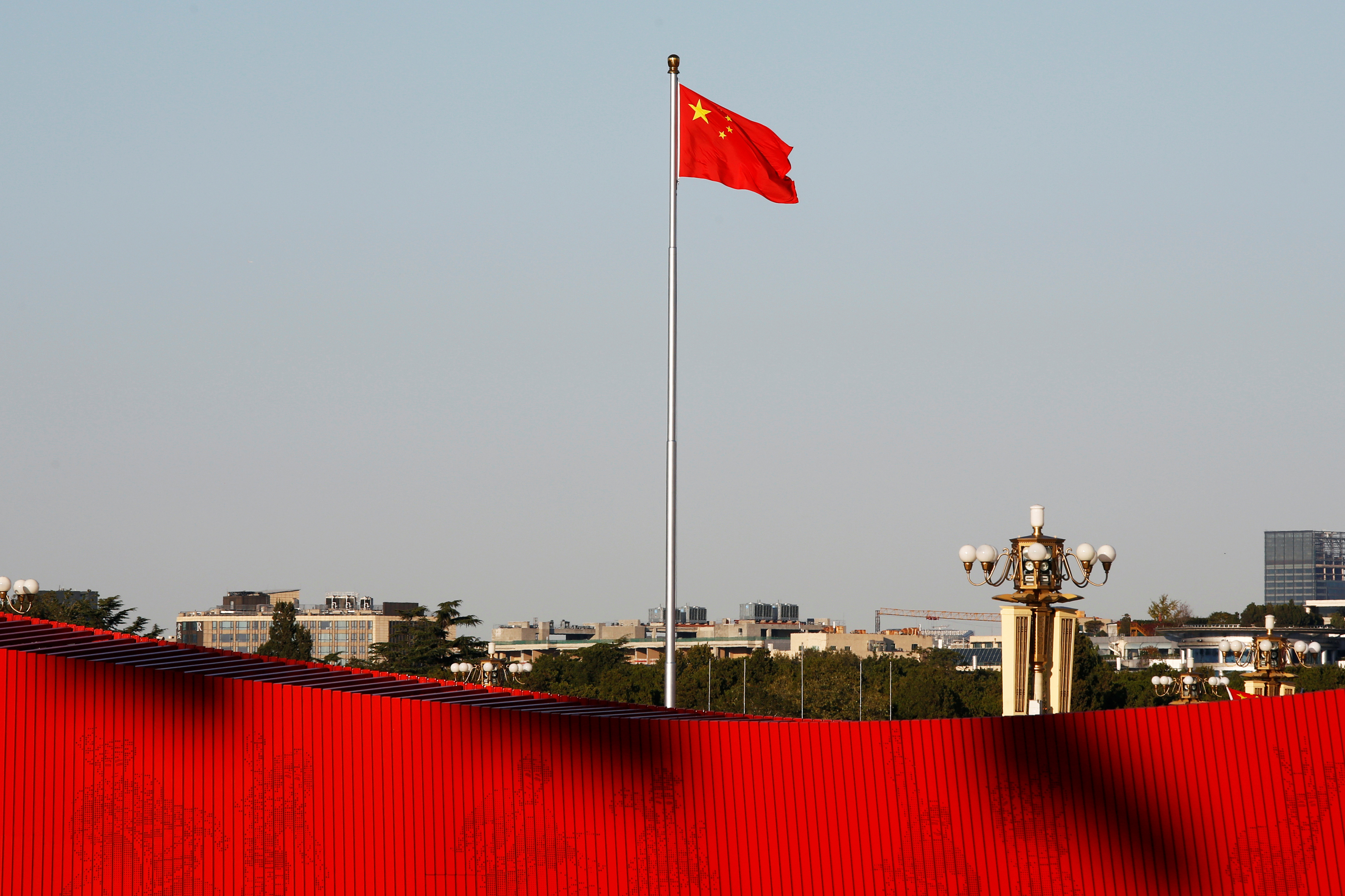 Chinese flag flutters at the Tiananmen Square in Beijing