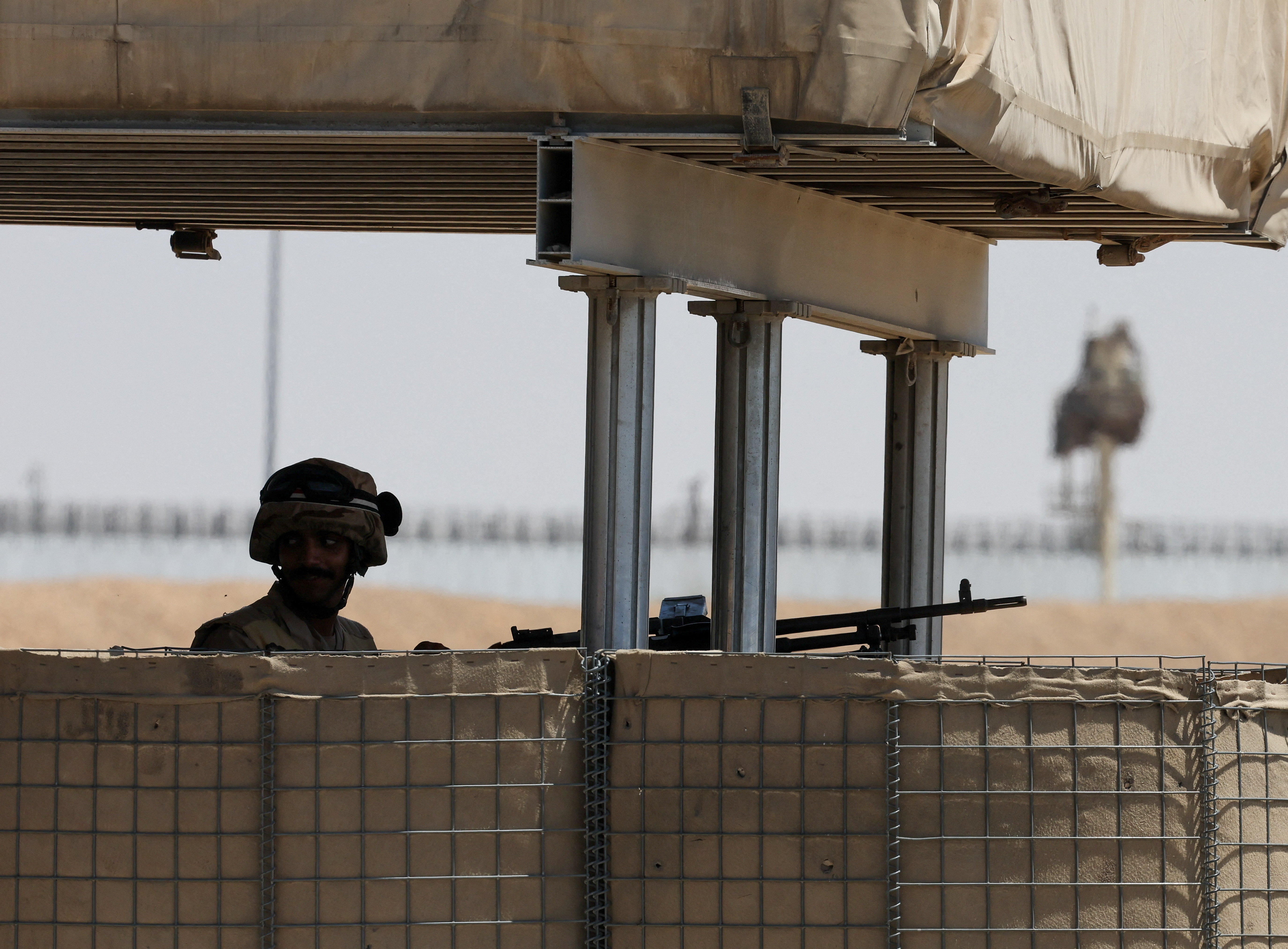 An Egyptian soldier looks on near the Rafah border crossing between Egypt and the Gaza Strip, in Rafah