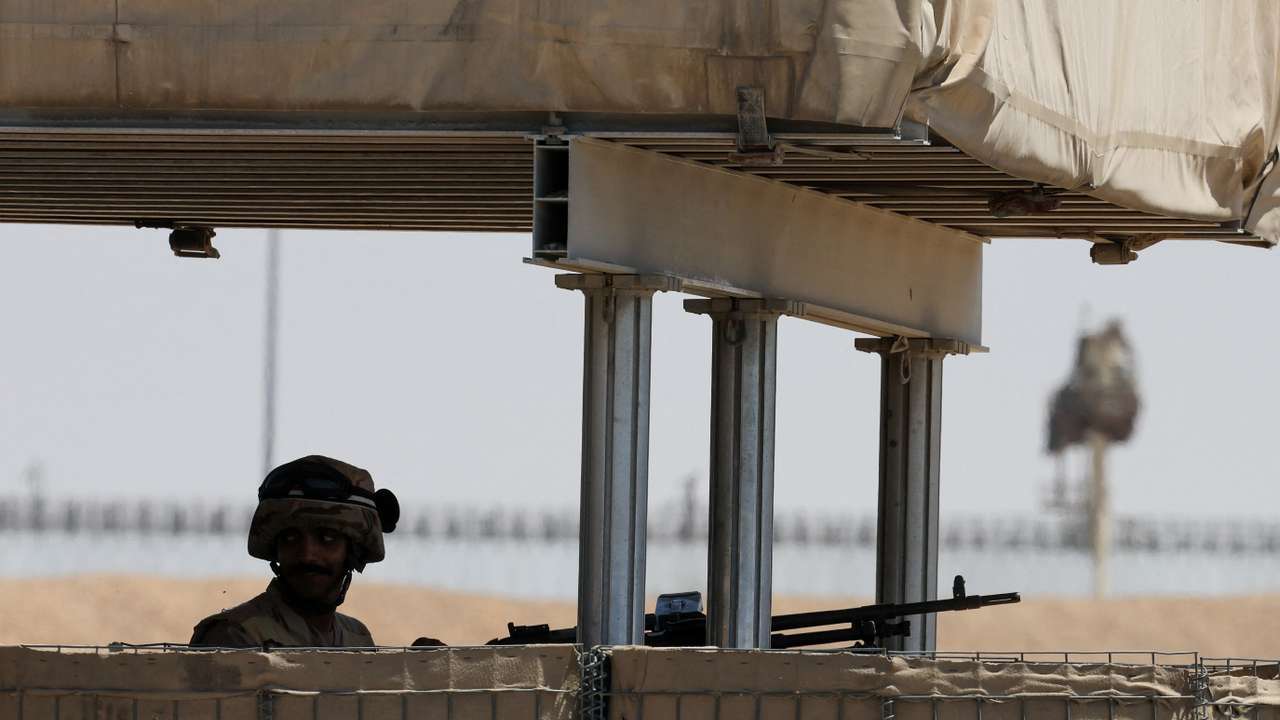An Egyptian soldier looks on near the Rafah border crossing between Egypt and the Gaza Strip, in Rafah