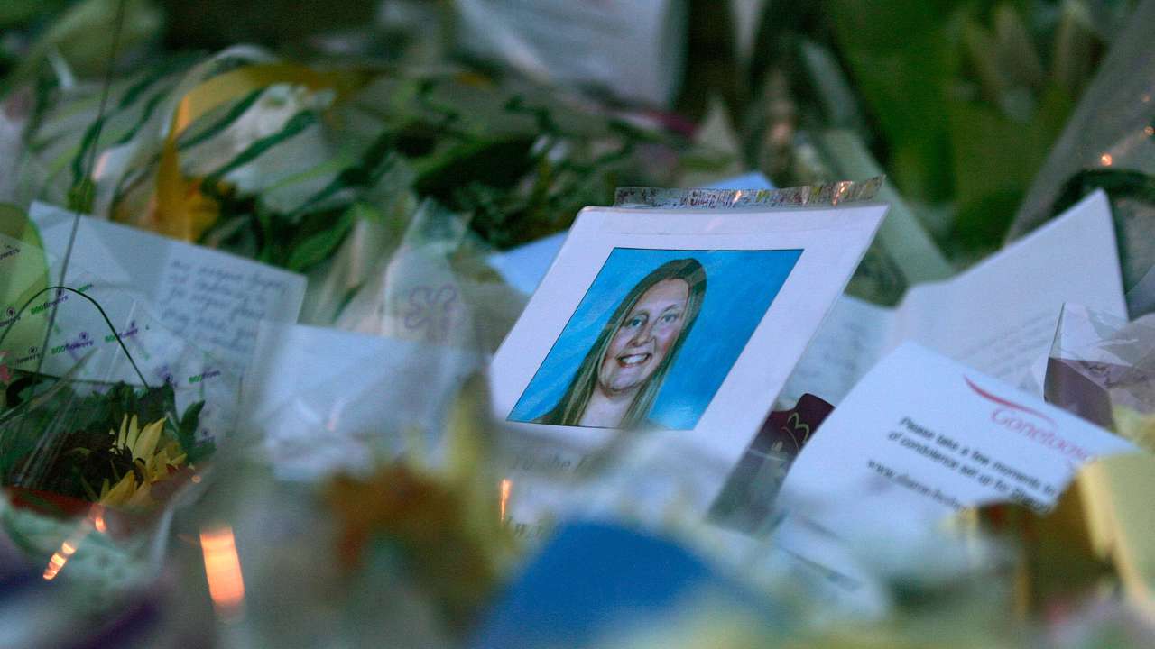 Photograph of murdered Beshenivsky is seen among floral tributes left by well-wishers in Bradford