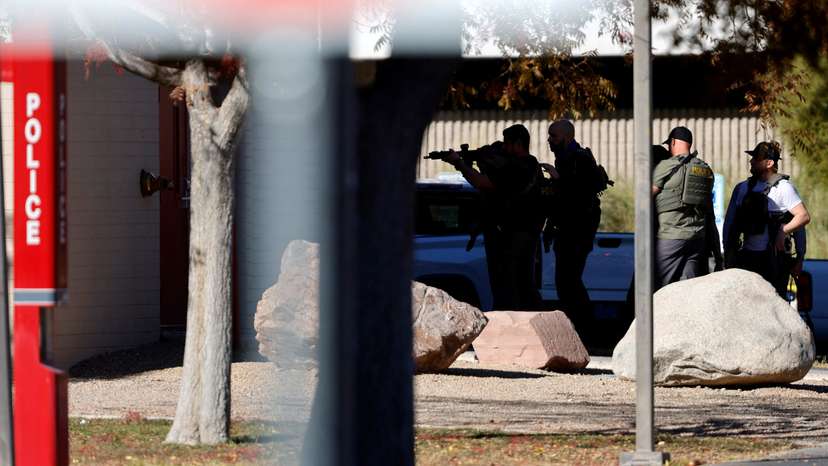 Law enforcement officers head into UNLV campus after reports of an active shooter in Las Vegas