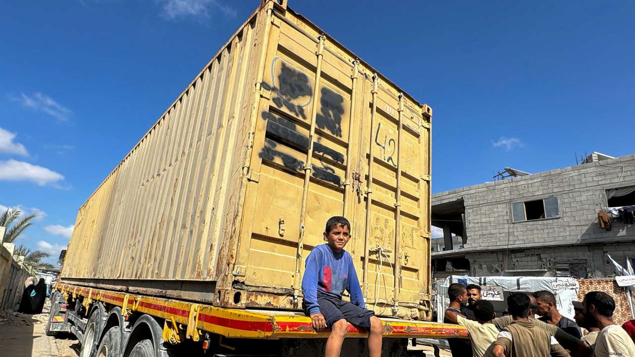 Israel sends scores of bodies to Gaza; Palestinians demand details before burying them
