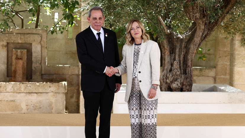 FILE PHOTO: Tunisia's Prime Minister Ahmed Hachani is welcomed by Italian Prime Minister Giorgia Meloni on the second day of a G7 summit in Italy
