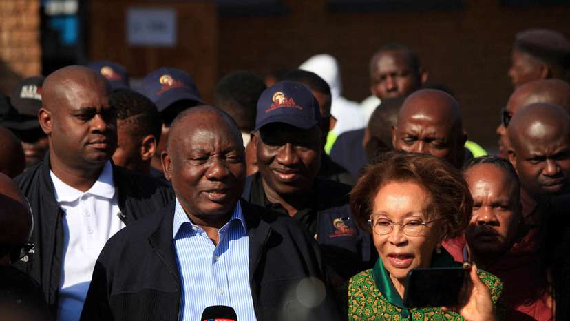 FILE PHOTO: South African president Cyril Ramaphosa votes in Soweto