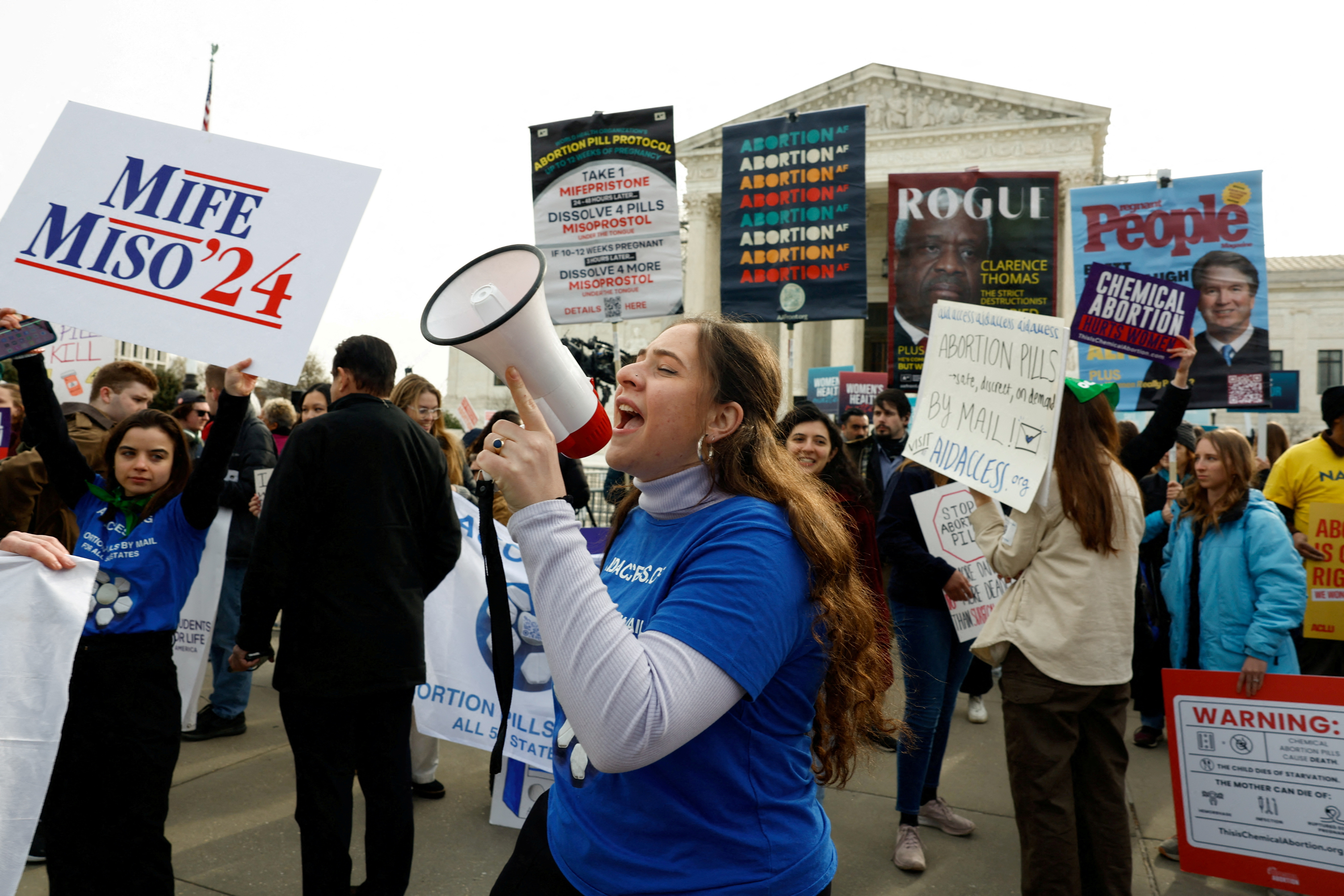 FILE PHOTO: Demonstrators rally outside the U.S. Supreme Court in Washington