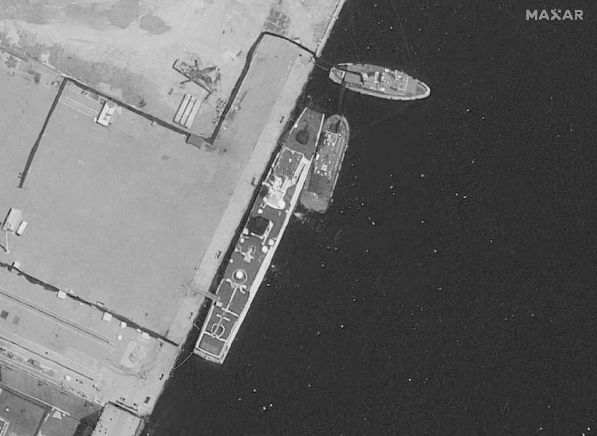 A satellite image of a recently-damaged Chinese coast guard vessel under repair, in the Yulin Naval Base, in Sanya