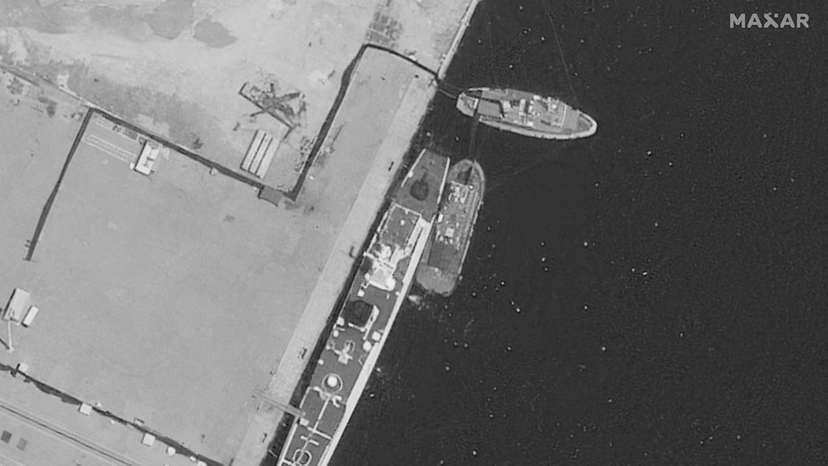 A satellite image of a recently-damaged Chinese coast guard vessel under repair, in the Yulin Naval Base, in Sanya
