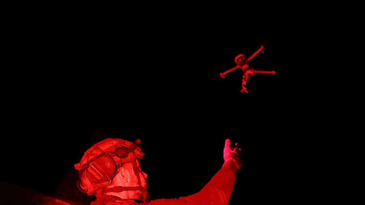 Ukrainian serviceman launches a combat drone at his frontline position near Pokrovsk