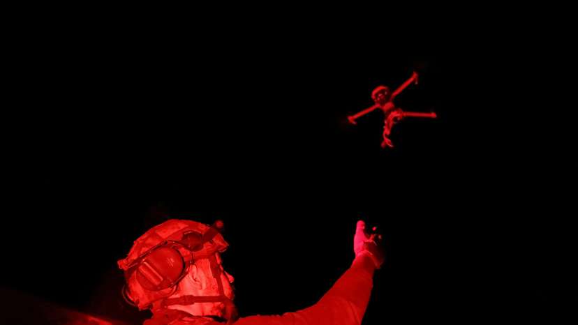 Ukrainian serviceman launches a combat drone at his frontline position near Pokrovsk