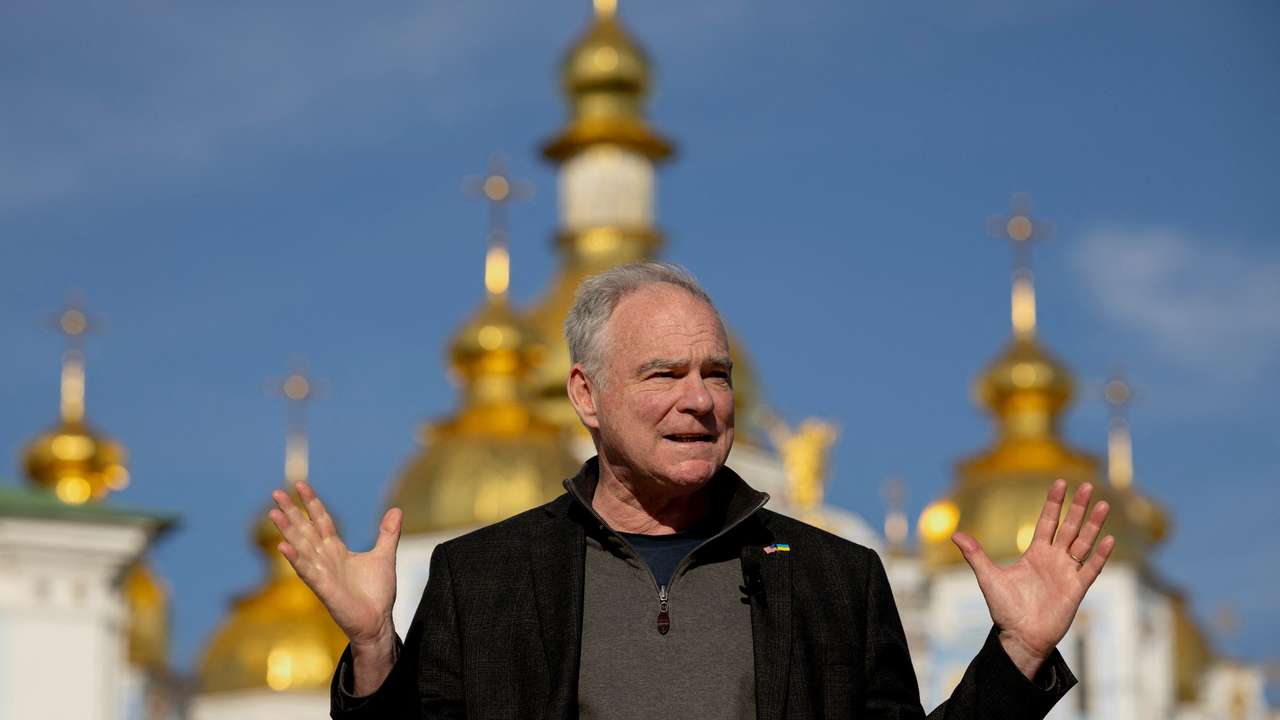 U.S. Senator Tim Kaine speaks to members of the media in front of Saint Michael's Cathedral in Kyiv
