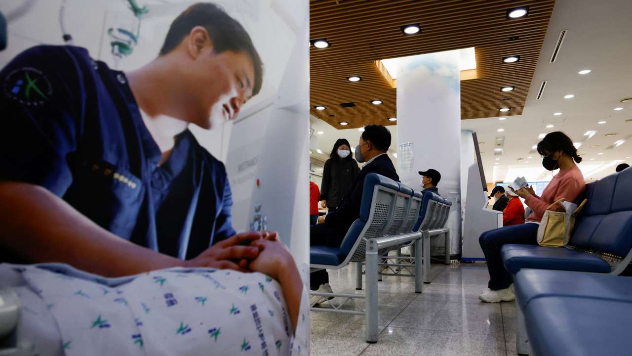 People sit as they wait at the Incheon Medical Center in Incheon