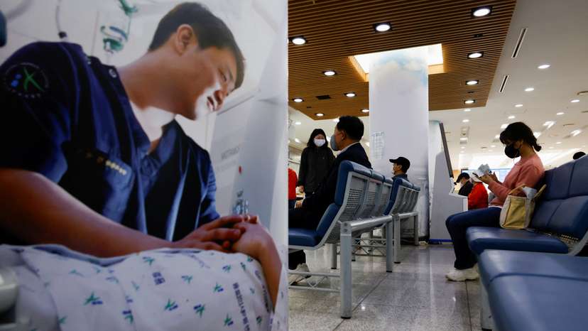 People sit as they wait at the Incheon Medical Center in Incheon