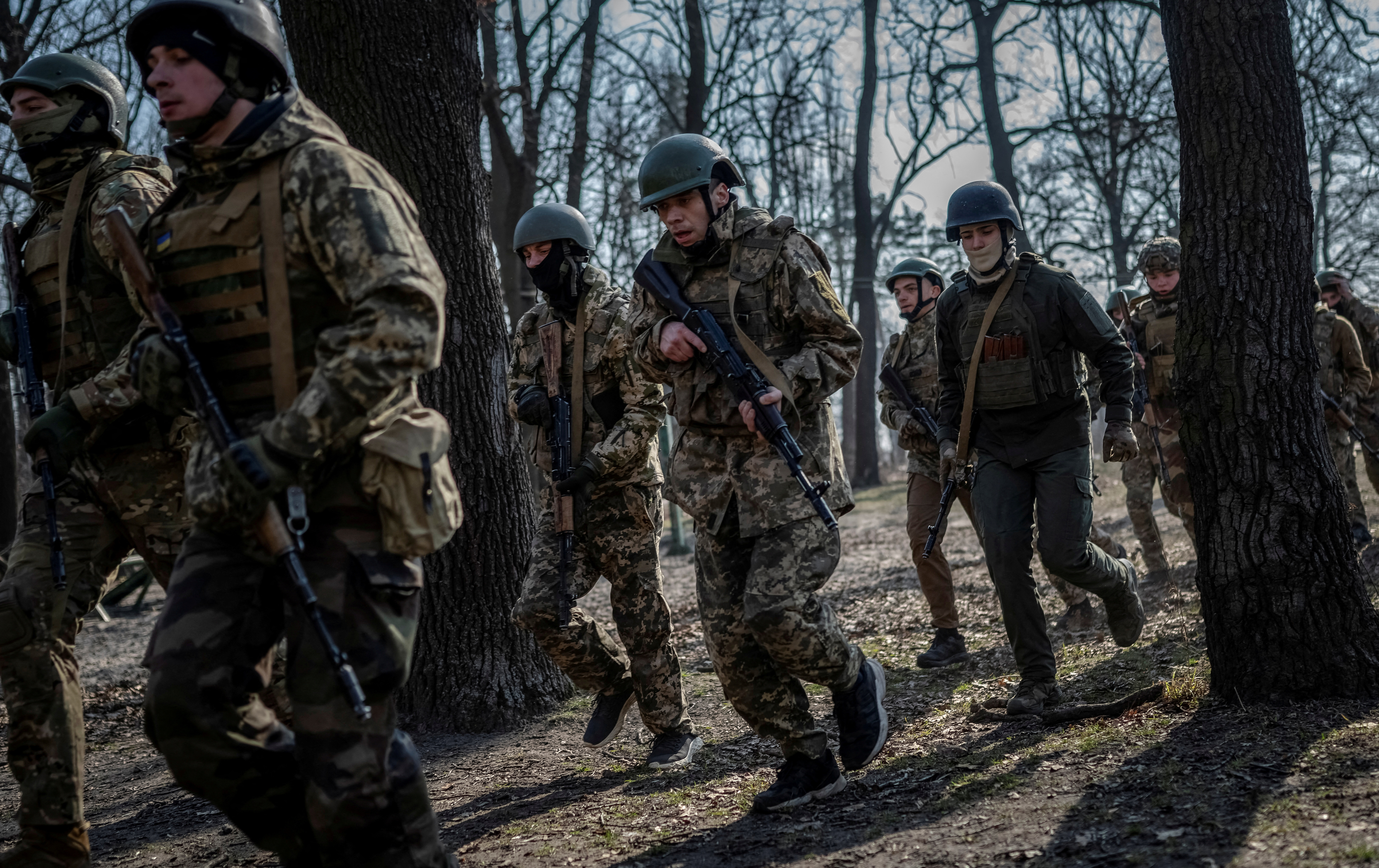 FILE PHOTO: Volunteers who aspire to join the 3rd Separate Assault Brigade of the Ukrainian Armed Forces take part in a basic training in Kyiv region
