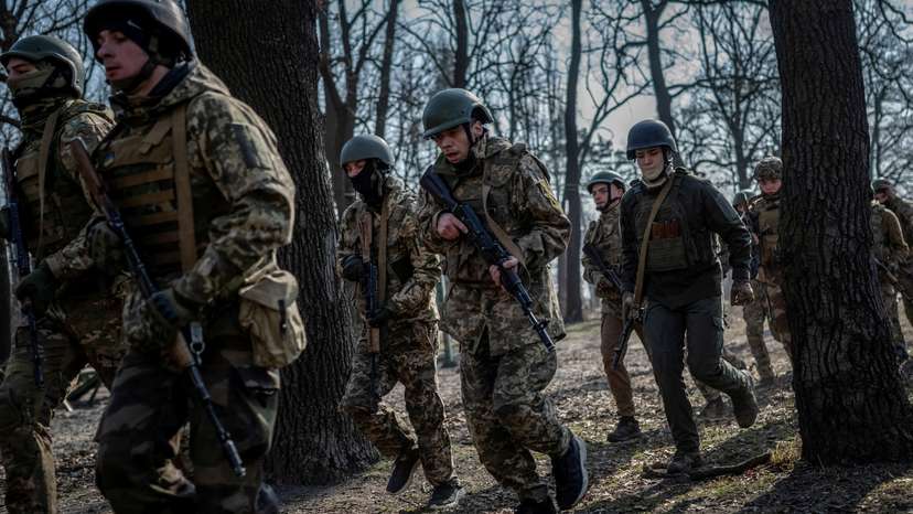 FILE PHOTO: Volunteers who aspire to join the 3rd Separate Assault Brigade of the Ukrainian Armed Forces take part in a basic training in Kyiv region