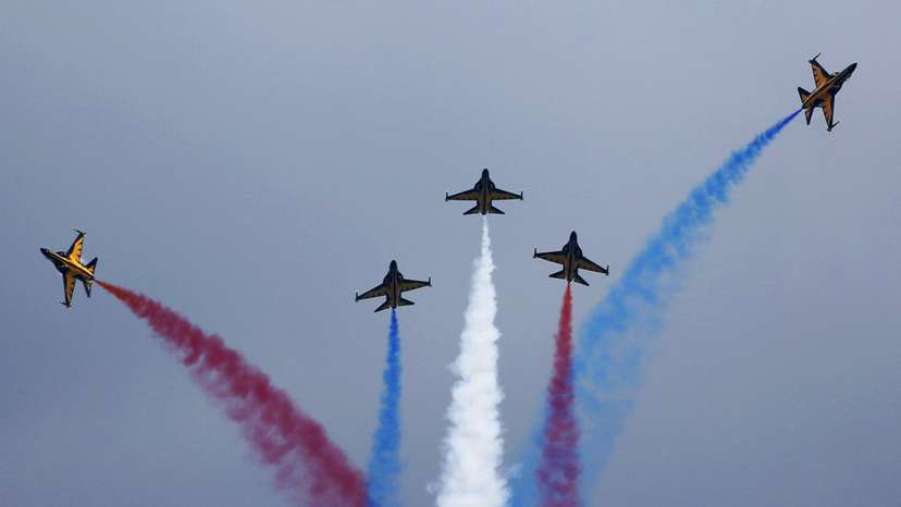 FILE PHOTO: South Korea's Black Eagles aerobatics team perform a manoeuvre during an aerial display at the Singapore Airshow at Changi Exhibition Center