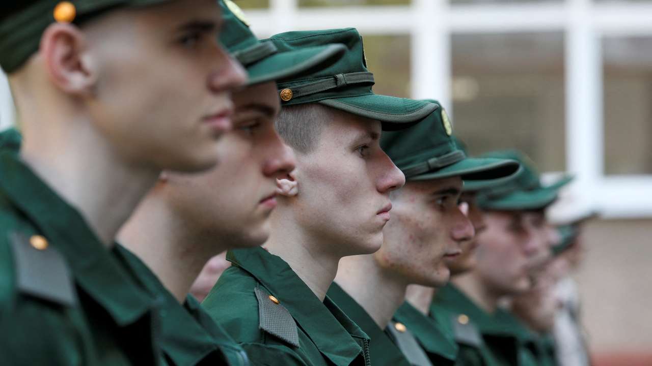 Russian conscripts depart for garrisons from a recruitment centre in Simferopol