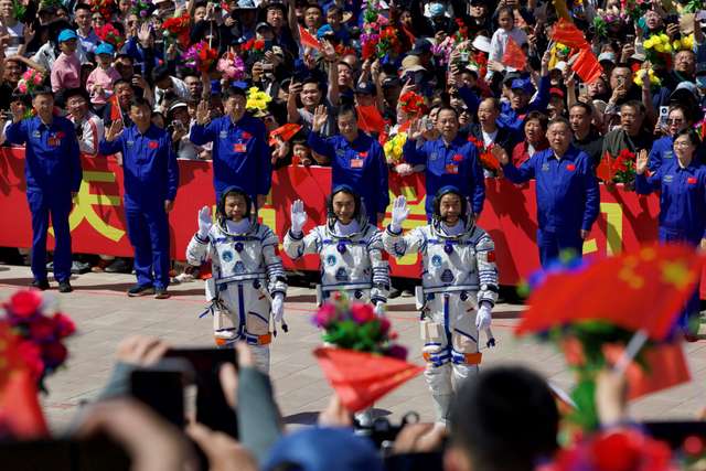 Astronauts attend a see-off ceremony for the Shenzhou-20 spaceflight mission at Jiuquan Satellite Launch