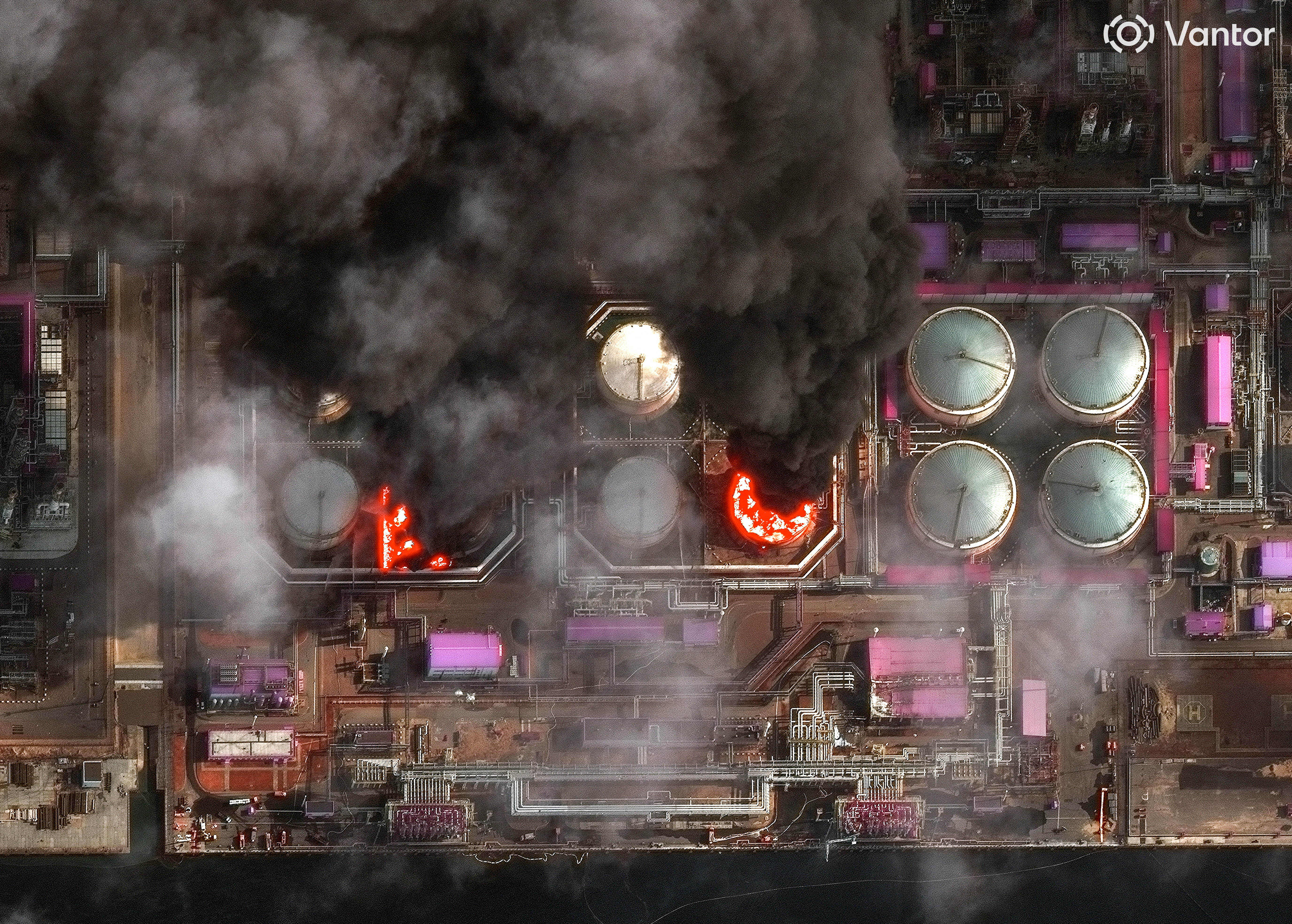 A satellite near-infrared image shows smoke rising from oil storage tanks at Russia's Baltic Sea port of Ust-Luga, which was struck multiple times in Ukrainian attacks, in Ust-Luga