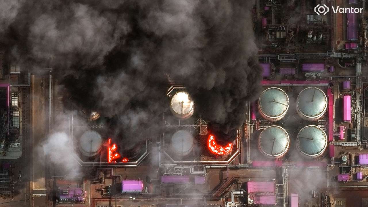 A satellite near-infrared image shows smoke rising from oil storage tanks at Russia's Baltic Sea port of Ust-Luga, which was struck multiple times in Ukrainian attacks, in Ust-Luga