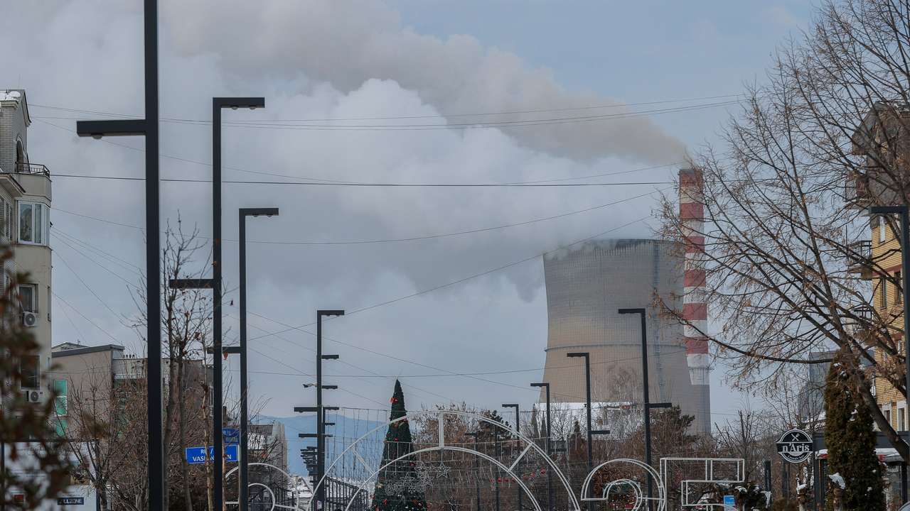 Smoke rises from the coal-fired power plant, in Obilic
