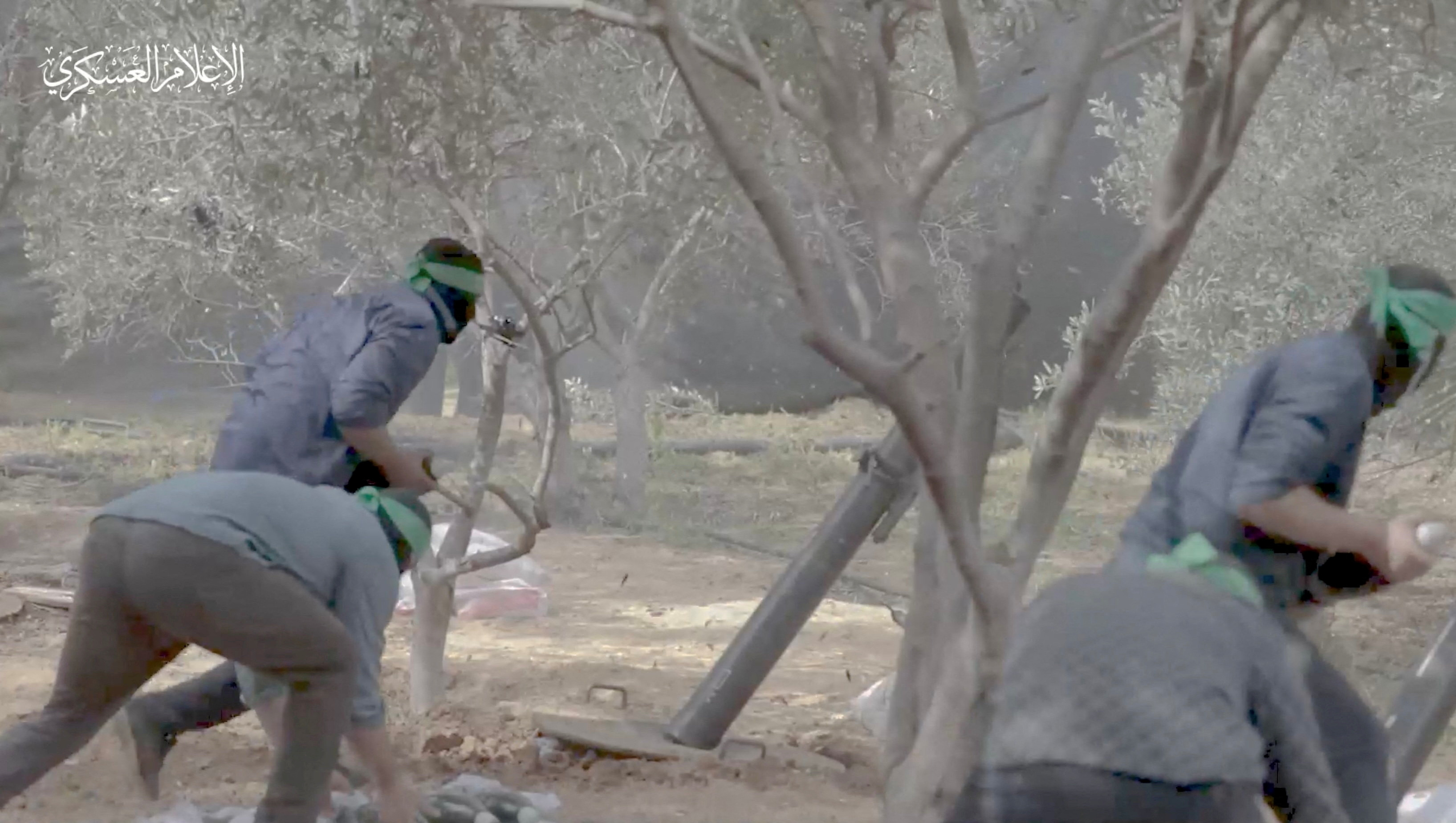 FILE PHOTO: Hamas releases footages showing what it says are its fighters firing mortar shells at Israeli forces