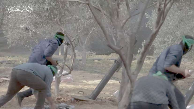 FILE PHOTO: Hamas releases footages showing what it says are its fighters firing mortar shells at Israeli forces