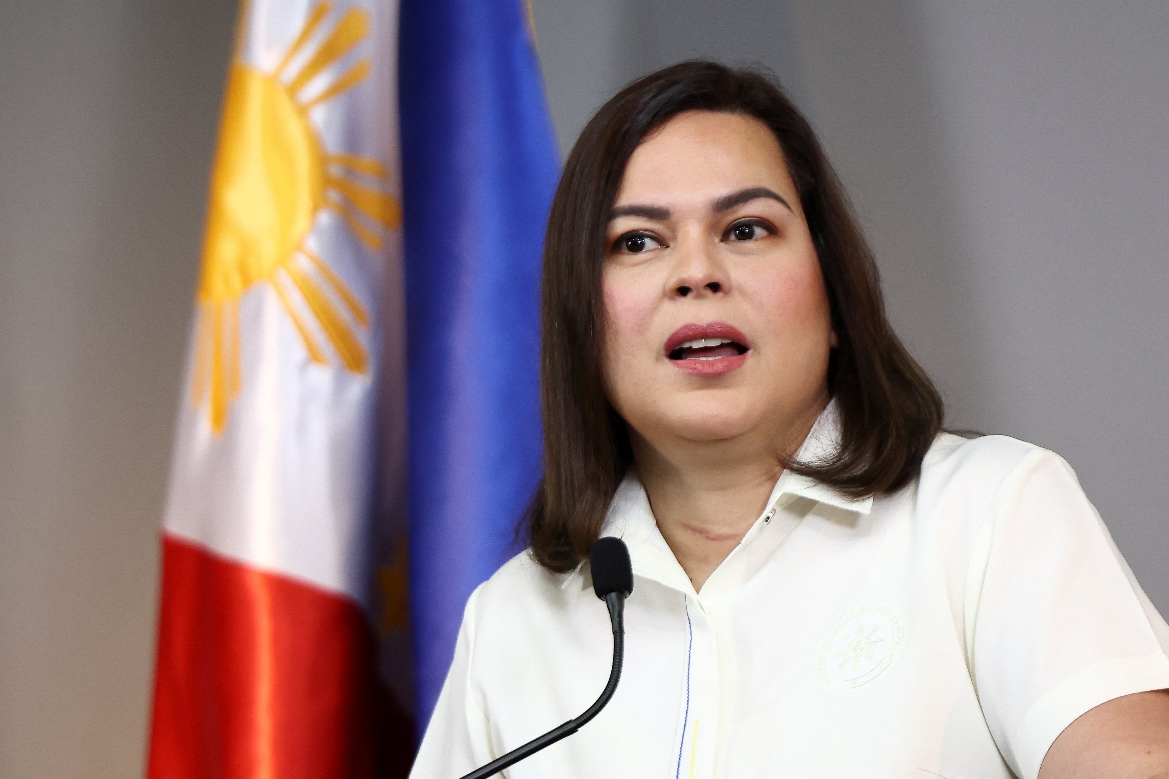 Philippine Vice President Sara Duterte delivers a statement following her impeachment by the lower house of the Congress