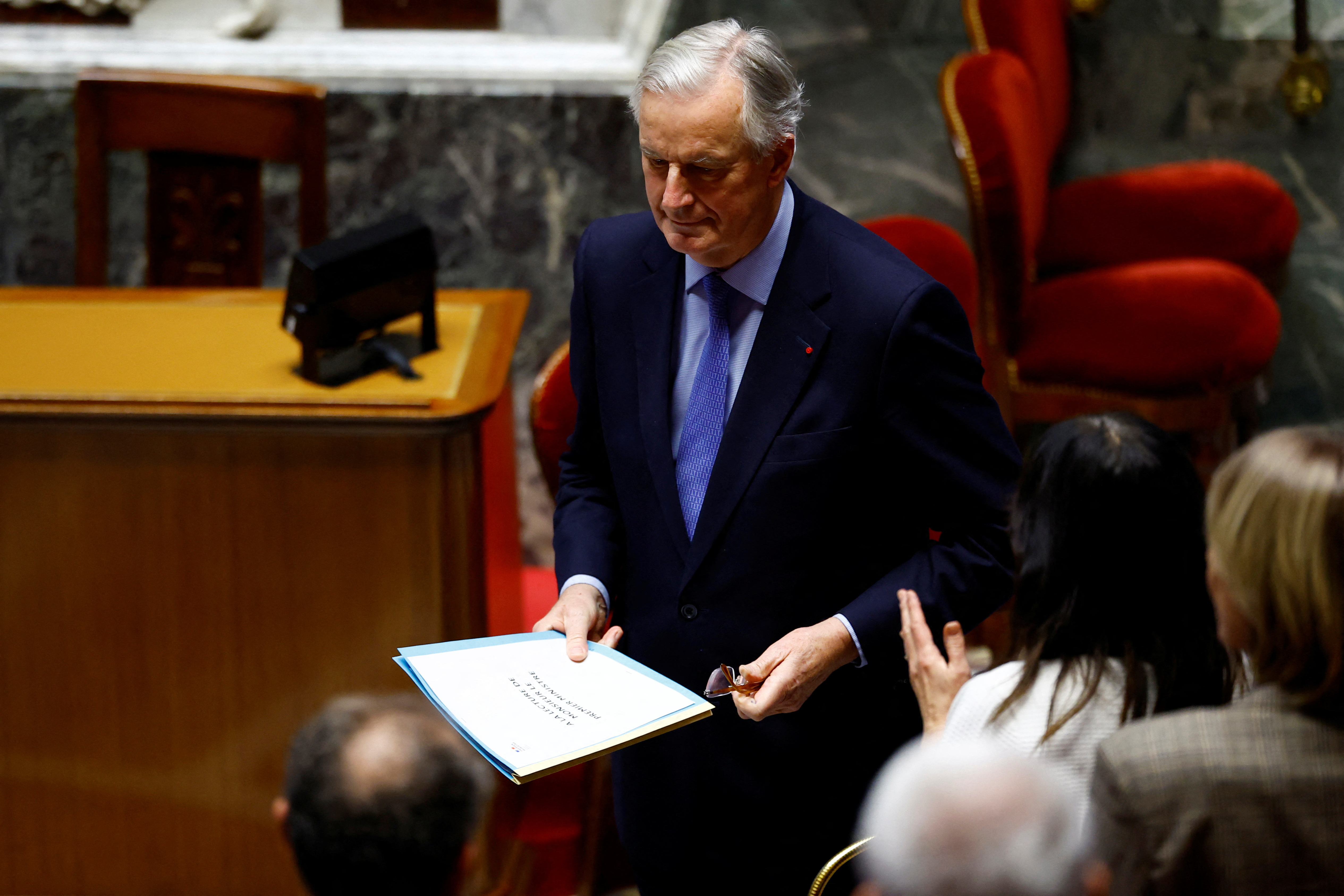 Lawmakers vote on no-confidence motion against the French government