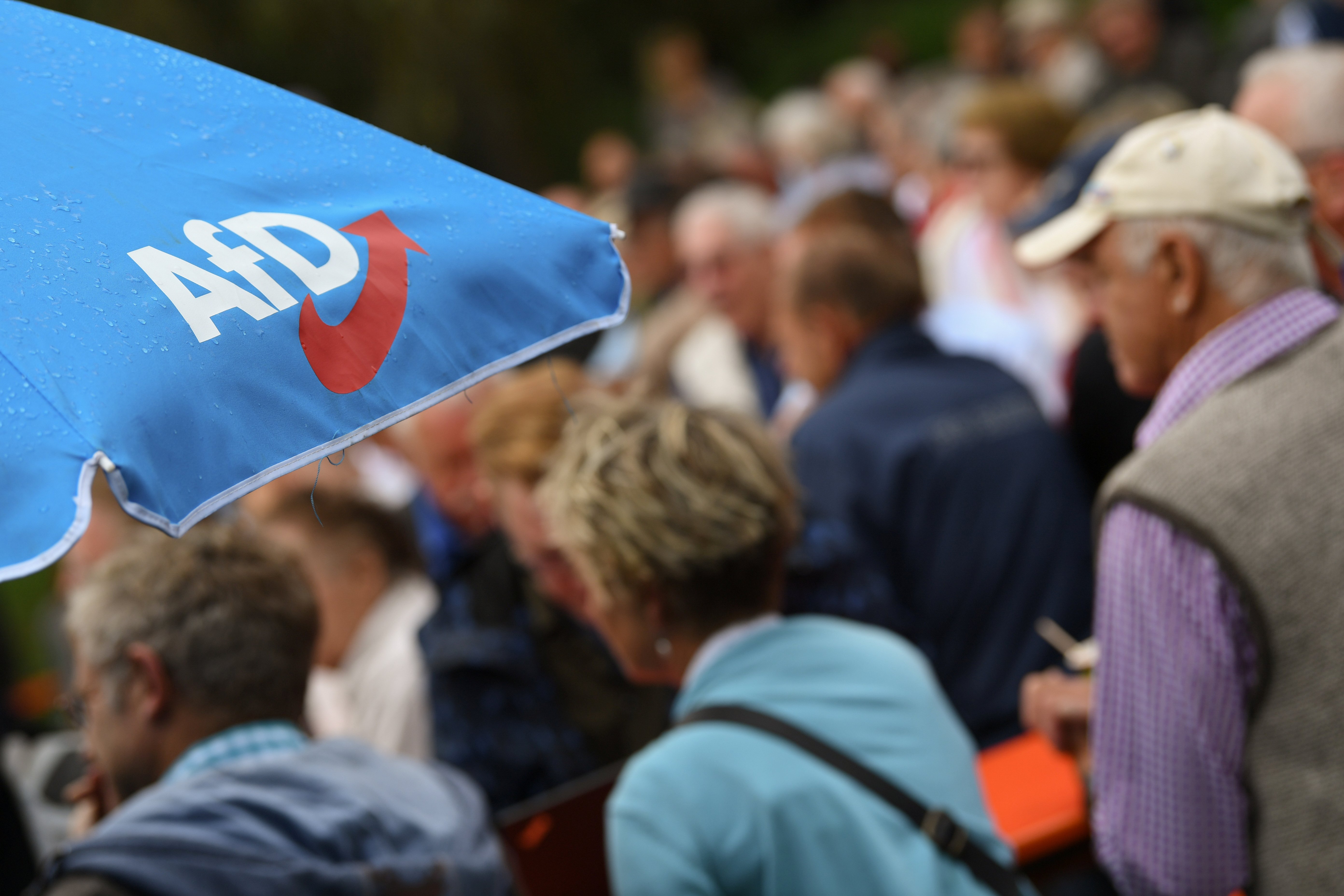 Supporters of the Alternative for Germany (AfD) attend their party's event at the Gillamoos Fair