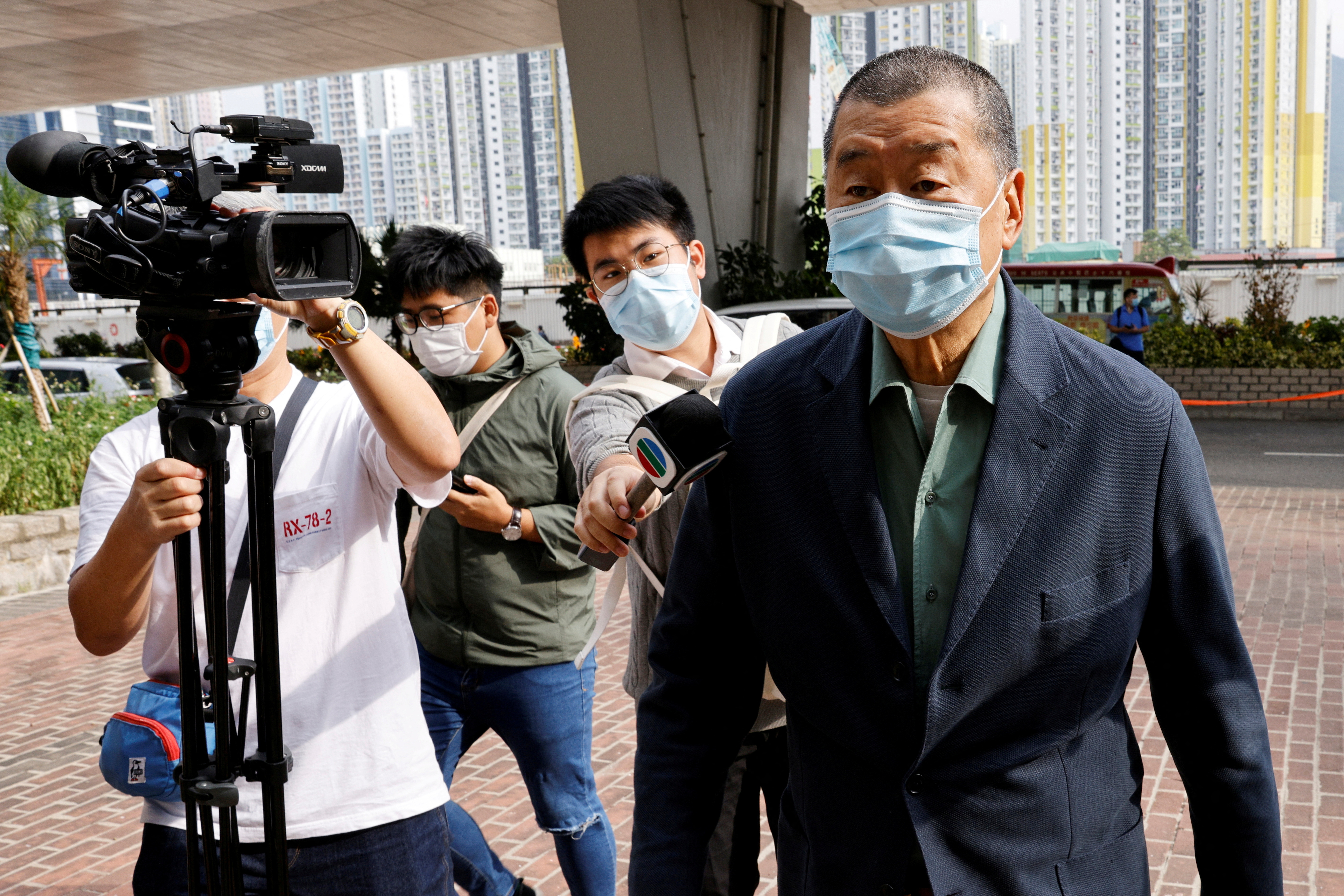 FILE PHOTO: Media mogul Jimmy Lai Chee-ying, founder of Apple Daily arrives at West Kowloon Magistrates's Courts to face charges related to an illegal vigil assembly commemorating the 1989 Tiananmen Square crackdown, in Hong Kong