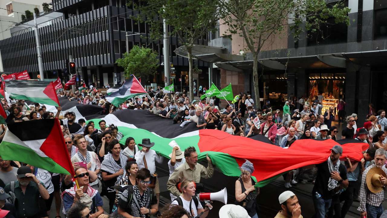 People take part in the 'Nationwide March for Palestine' in Sydney