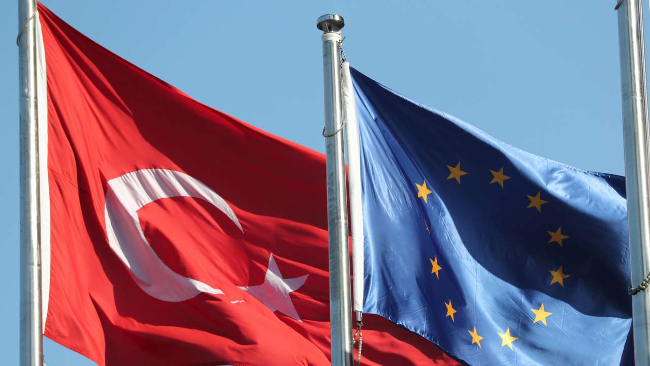 European Union and Turkish flags fly at the business and financial district of Levent in Istanbul
