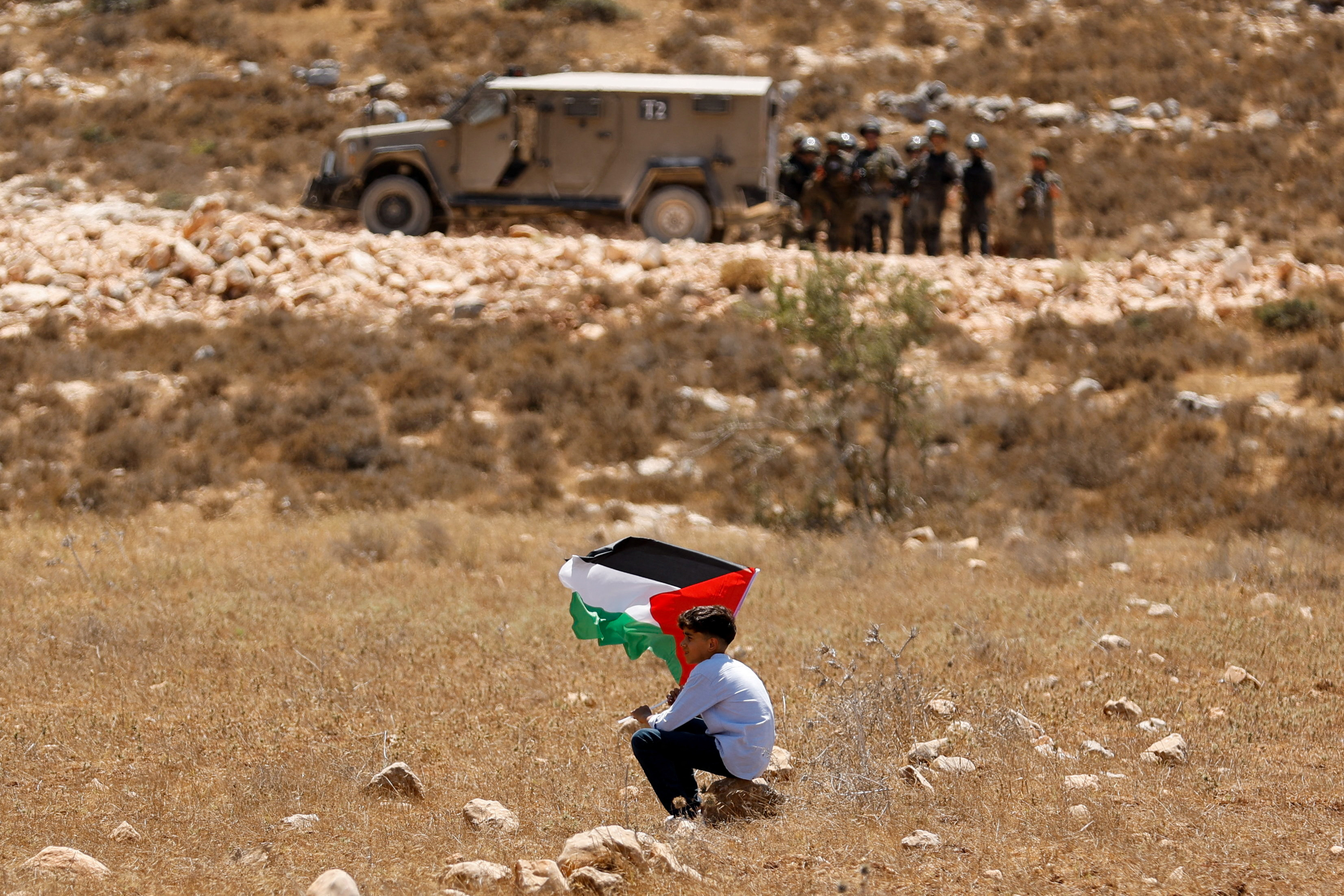 Palestinians demonstrate against what they say is Israel's confiscation of their land in Raba