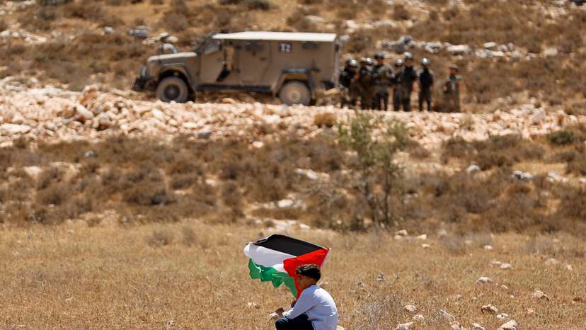 Palestinians demonstrate against what they say is Israel's confiscation of their land in Raba