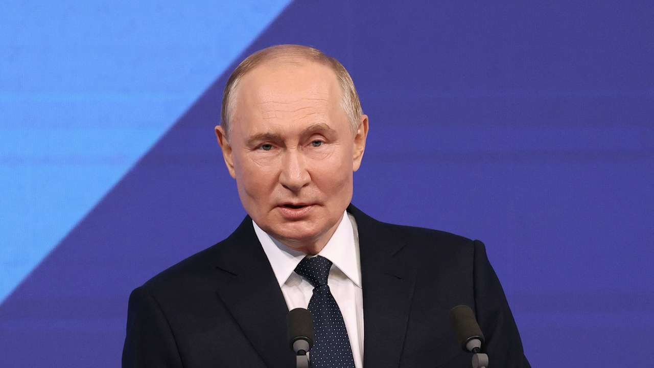 Russian President Putin addresses the audience before a concert in Moscow